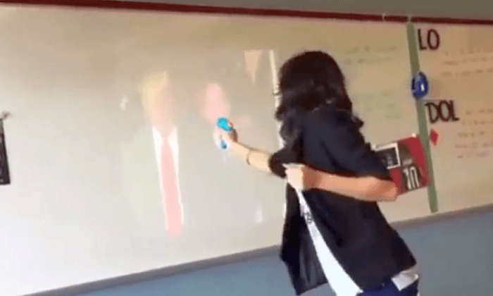 Dallas Teacher Suspended After Video Shows Her Shooting Squirt Gun at Trump