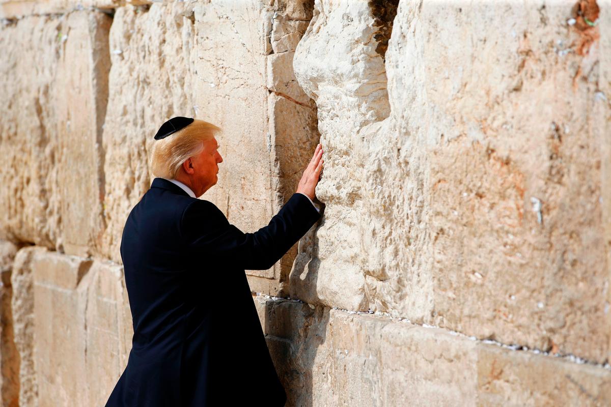 President Donald Trump prays at the Western wall in Jerusalem on May 22, 2017. (RONEN ZVULUN/AFP/Getty Images)