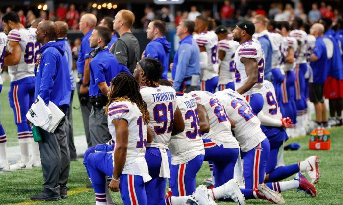 NFL Week 4 Protests: Dozens Kneel, Sit and Raise Fists During Anthem