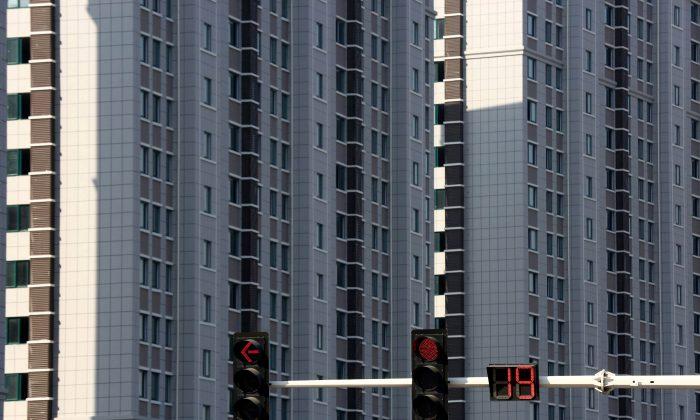 China Property Market to Cool in 2019, Weigh on Economy