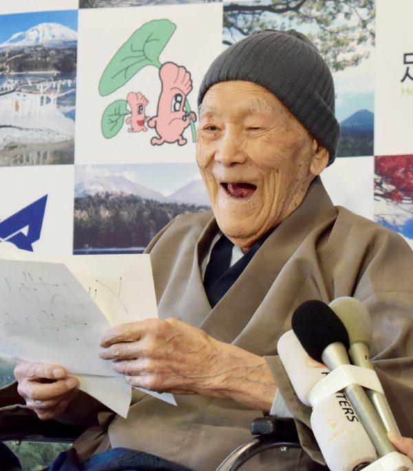 File—Masazo Nonaka when he was 112 years old, receiving a Guinness World Records certificate for the title of oldest man living at a ceremony in Ashoro, Japan, on April 10, 2018. Nonaka died on Jan. 20, 2019, aged 113. (Jiji Press/AFP/Getty Images)