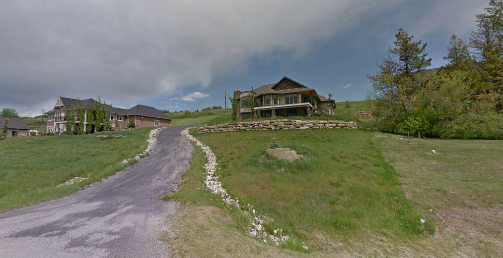 A Google Street View photo shows the neighborhood near the home in Millarville, Canada. (Google Street View)