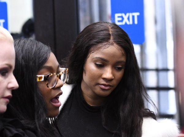 Azriel Clary, left, 21, and Joycelyn Savage, 23, leave the Leighton Criminal Courthouse in Chicago, on Feb. 23, 2019, following R&B star R. Kelly's first court appearance on sexual abuse charges. (Matt Marton/AP Photo)