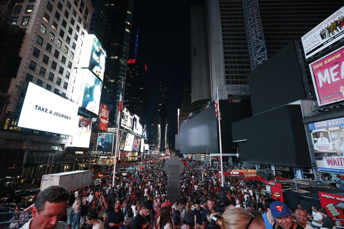 Screens in Time Square are black during a widespread power outage in New York, on July 13, 2019. (Michael Owens/AP Photo)