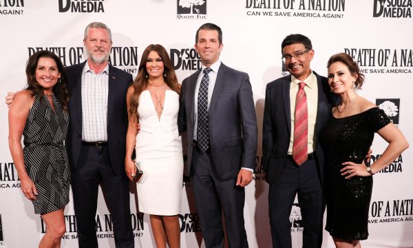 Jerry Falwell Jr. (2nd L) with his wife Becki, Donald Trump Jr. and girlfriend Kimberly Guilfoyle, and filmmaker Dinesh D'Souza and his wife Debbie Fancherat the premiere of âDeath of a Nationâ in Washington on Aug. 1, 2018. (Samira Bouaou/The Epoch Times)