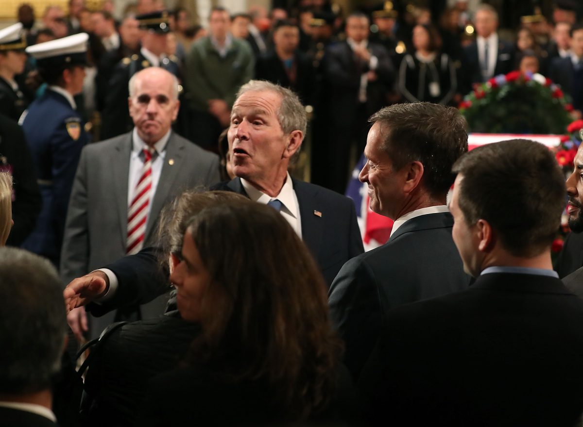 george bush meets mourners