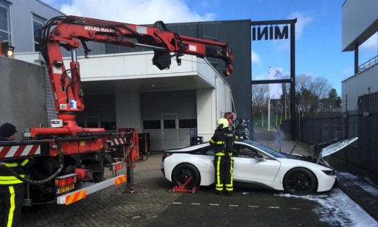 Firefighters Dunk Smoking Bmw Hybrid Electric Vehicle In Huge Vat To Dutch Fire Crews Put A Smoking Bmw I8 Into Huge Vat Of Water In Brabant